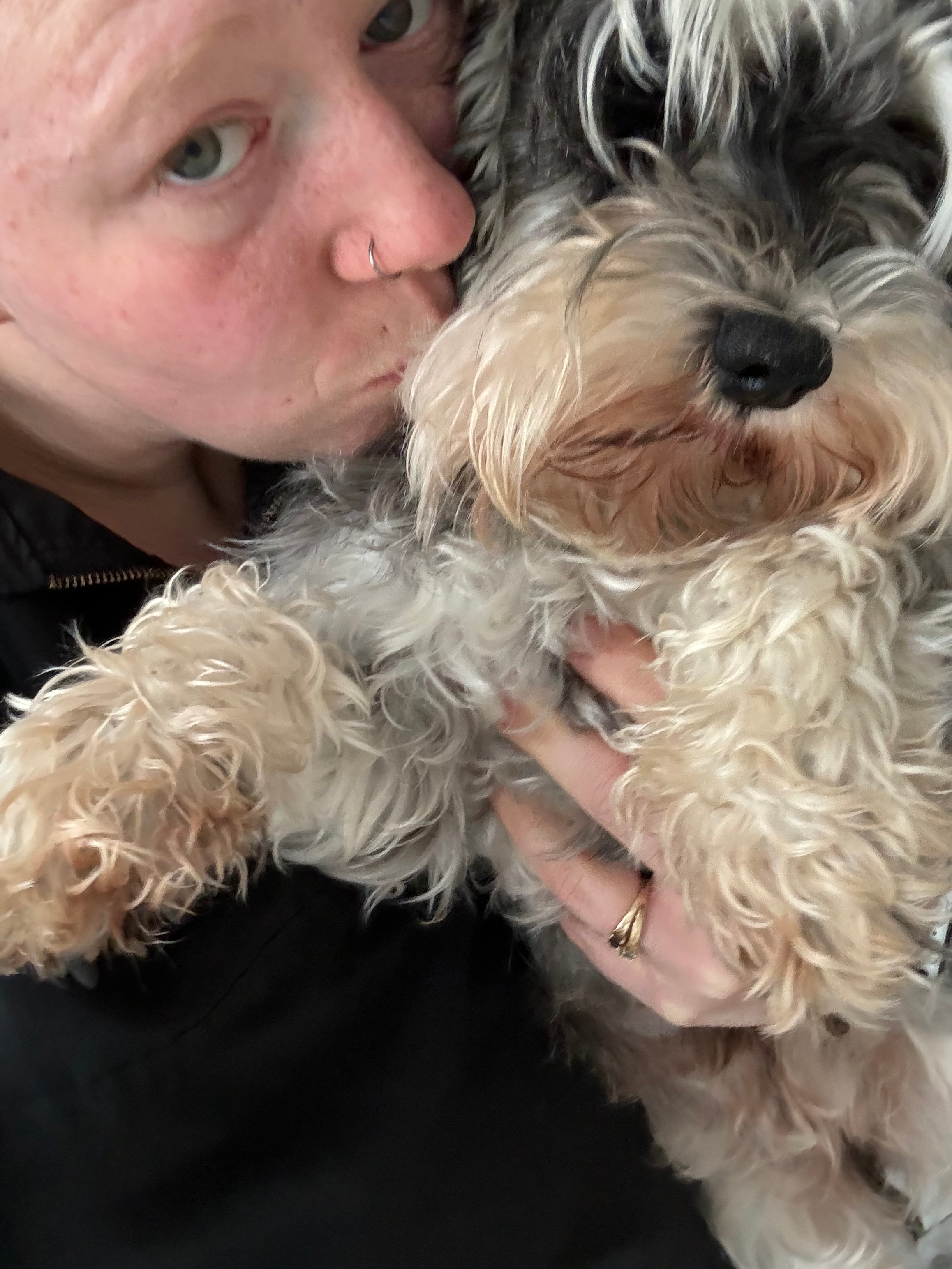 Olivia with a dog at Paws to Perfection